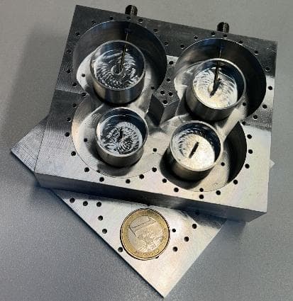 4th-order coaxial Stepped-Impedance Resonator filter next to a 1-euro coin